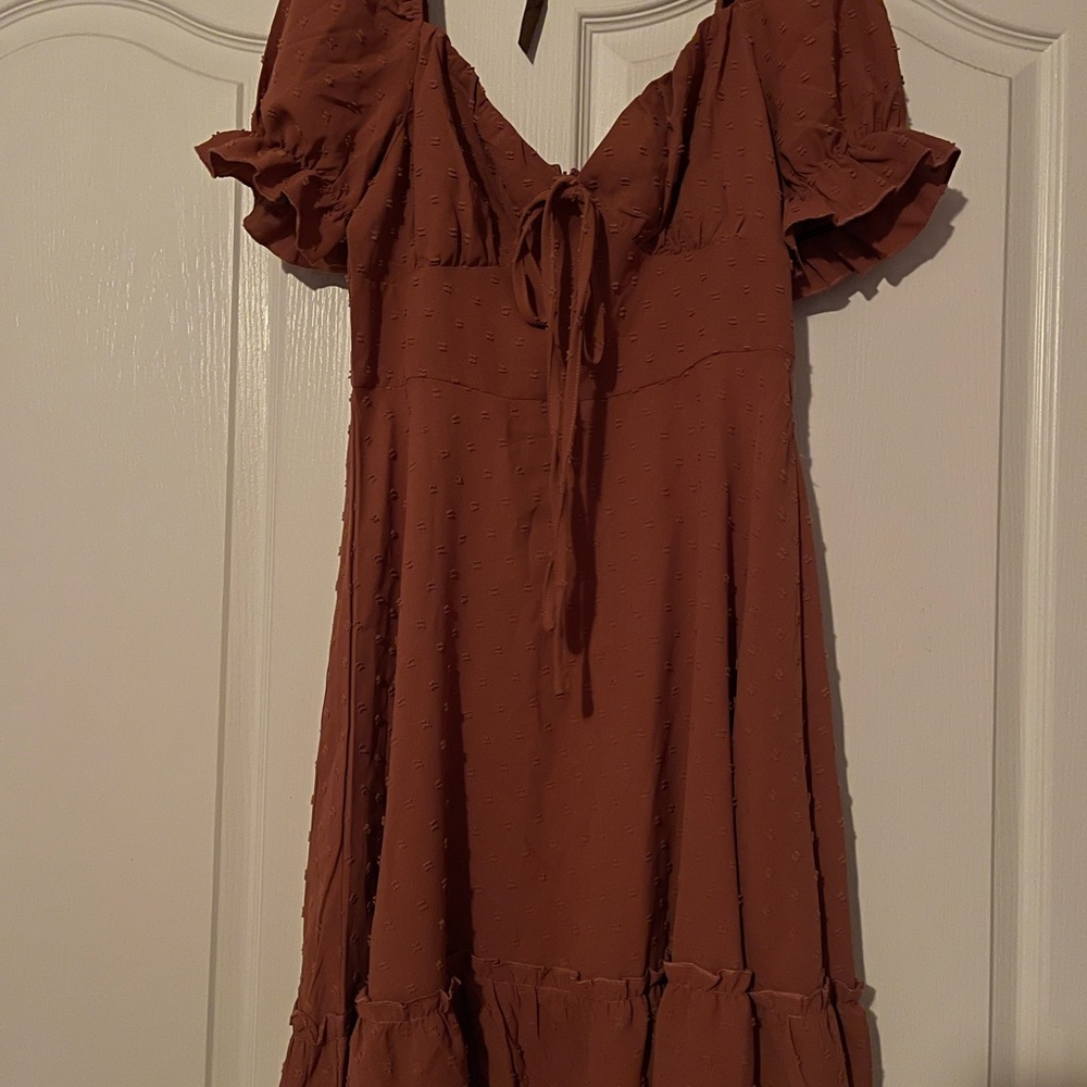 A pink dress, never worn